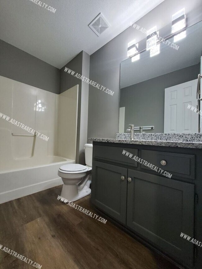 Building Photo - Gorgeous Modern Shawnee Townhome!! So much...