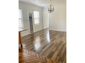 Building Photo - NEW LISTING! Upper End 2BR/2BA,Granite, Ha...