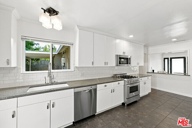 Building Photo - 4415 Woodland Ave