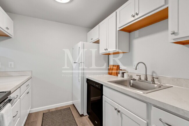 Building Photo - Modern Comfort in Tumwater – Renovated Upstairs End Unit with Move-In Specials!
