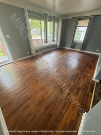 Building Photo - 4 Bedroom Home w/ Attached Garage and a Su...