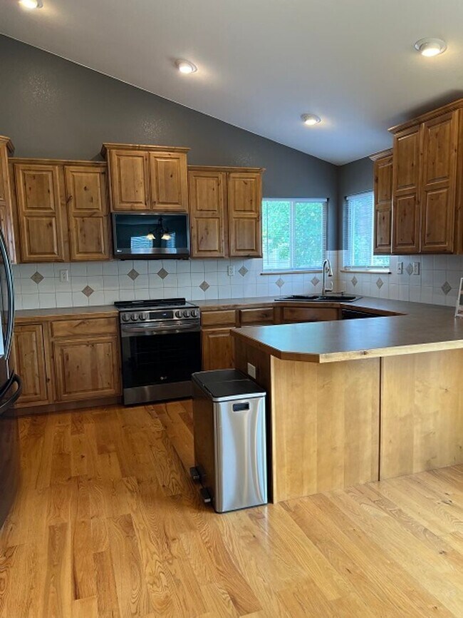 Building Photo - Spacious 5-Bedroom Home with Finished Base...