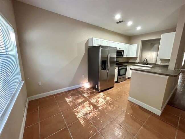 Building Photo - 6211 Ashbury Palms Dr
