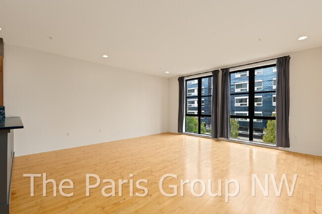Building Photo - Exceptional 2 Story CapHill Condo * 2 Pkg Spaces, EV Charger & Rooftop Views