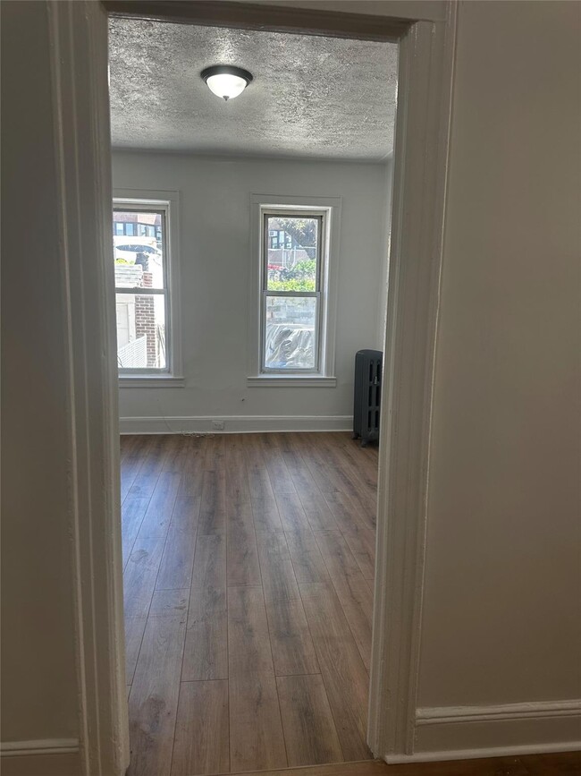 Building Photo - 26-33 96th St