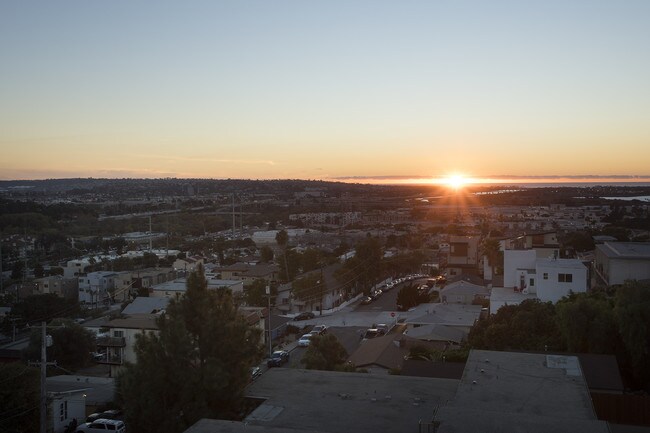 Building Photo - Must See 4 BR Townhome Blocks to USD with ...