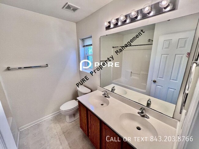 Building Photo - 7975 Shadow Oak Dr