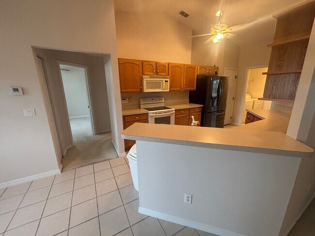 Building Photo - Move in ready 3/2 in 55+ community - near everything