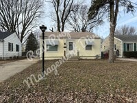 Building Photo - **Charming 2-Bed, 1-Bath Home with Retro Flair + Garage & Yard**