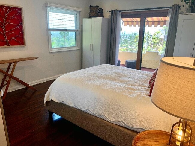 Bedroom, with balcony, loads of light. - 1760 N Fairfax Ave