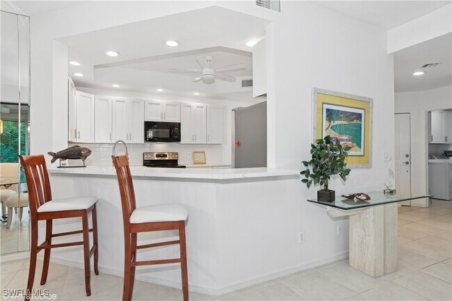 Building Photo - 7048 Pelican Bay Blvd