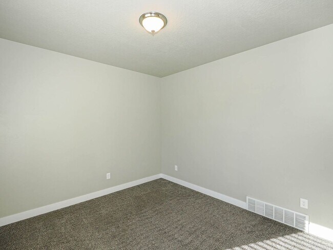 Building Photo - 4-bedroom, 2.5 bathroom Home