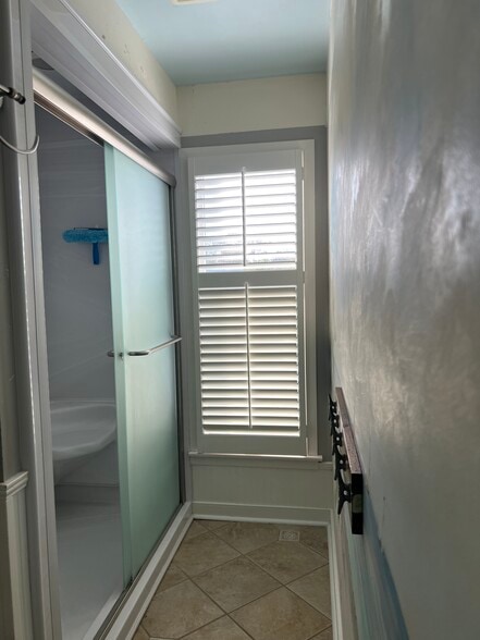 Hall bath with walk in shower Unit B - 301 Butler Ave