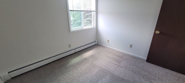 Building Photo - Upper 2 Bedroom Apartment – Heat Included - Available: First Week of July  2026