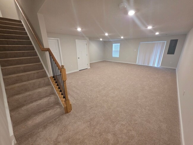 Building Photo - Luxury 4-Bedroom Townhome with Finished Walkout Basement & River Views