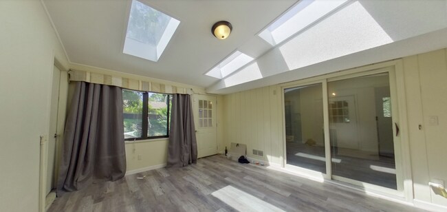 Building Photo - 3D Tour Available! West Side Home + Sunroom + Attached Garage + Pets Welcome + Washer & Dryer!  A...