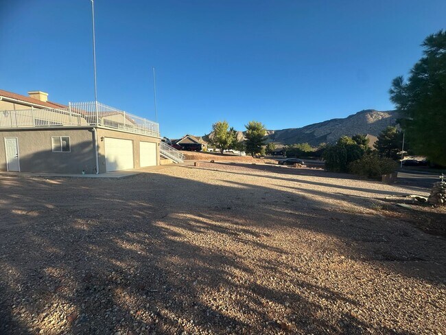 Building Photo - Quiet neighborhood, 3 bedroom, 2 bath home, huge front patio/deck, RV parking!