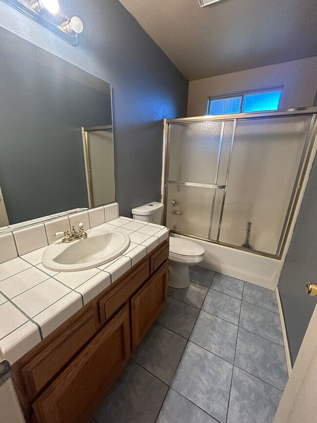Building Photo - Take a look at this charming single family...