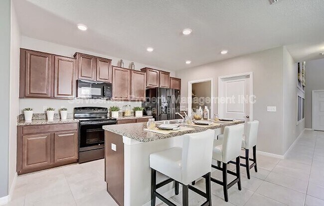Building Photo - 7418 Rosy Periwinkle Ct