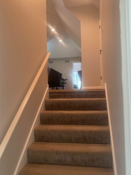 Entry stairs to apartment. - 5107 Timber Ln