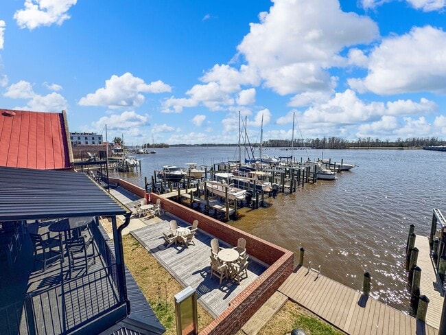 Building Photo - Fully Furnished Waterfront Elegance on Mai...