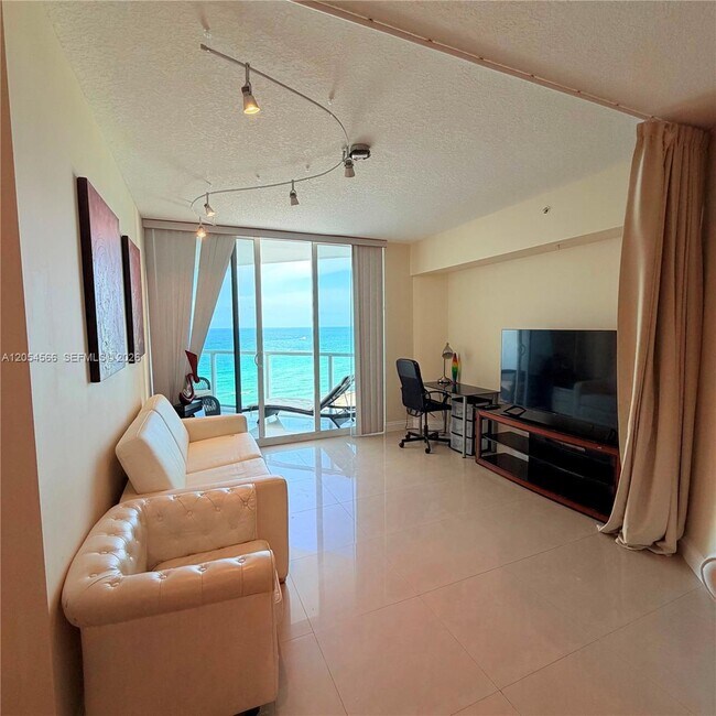 Building Photo - 16699 Collins Ave