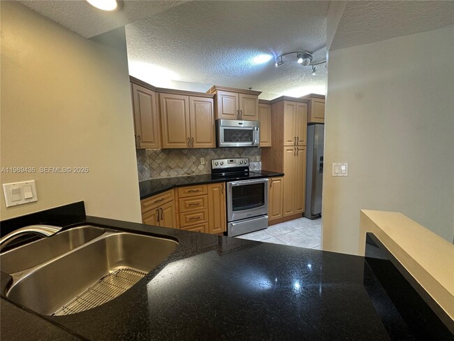 Building Photo - 10401 W Broward Blvd