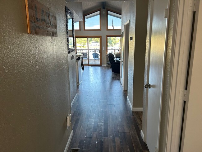 Building Photo - Don't Miss out on a Summer at the Lake.  Beautiful Fully Furnished Lake Front Home available MAY-...