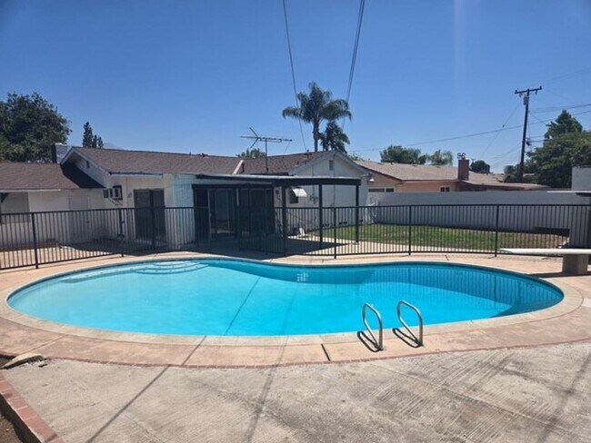 Building Photo - Summer-Ready Pool Home in Pomona