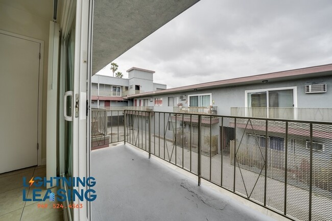 Building Photo - Spacious and Stylish 1-Bedroom with Balcon...