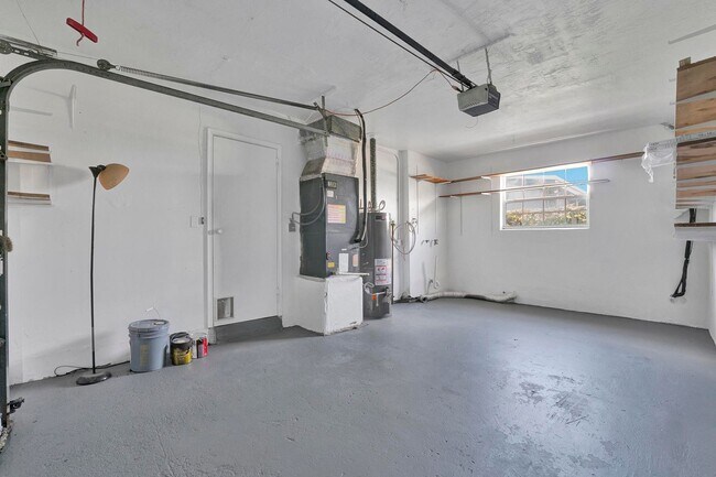 Building Photo - Sunrise Gem: Updated 2-Bed, 2-Bath with Garage Parking