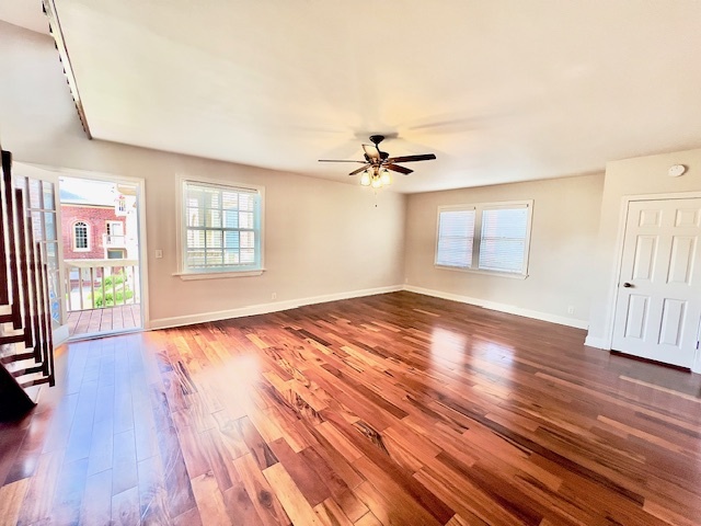 Living room with a door open to the balcony - 849 Lasalle St