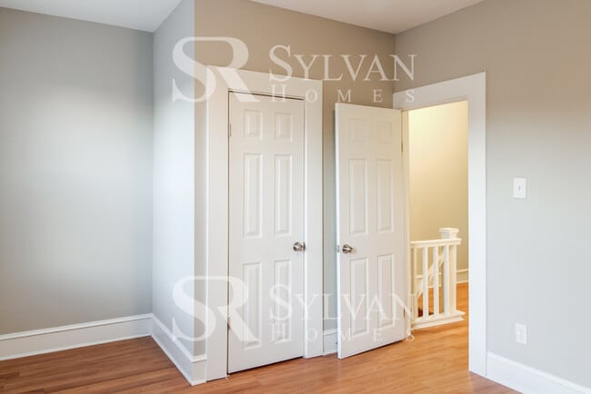 Building Photo - Welcome to this charming abode.