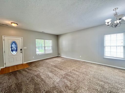 Building Photo - Charming 4BD, 2.5BA Durham Home with a Bonus Sun-Room & Fenced In Yard Only 10 Minutes Away from ...