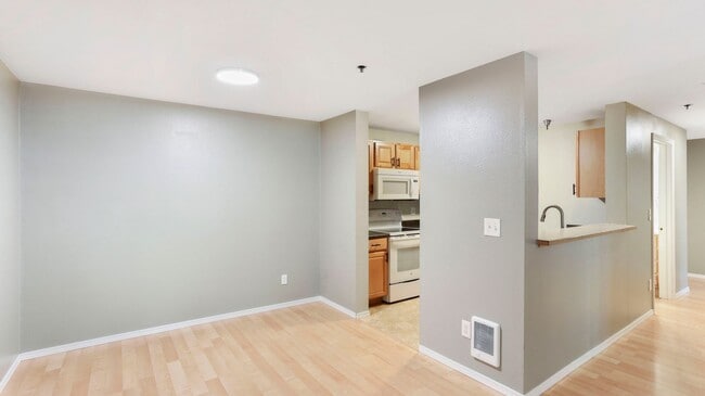 Building Photo - This ground floor corner-unit condo