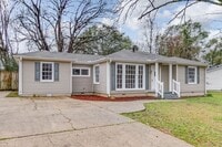 Building Photo - Three bedroom two bath