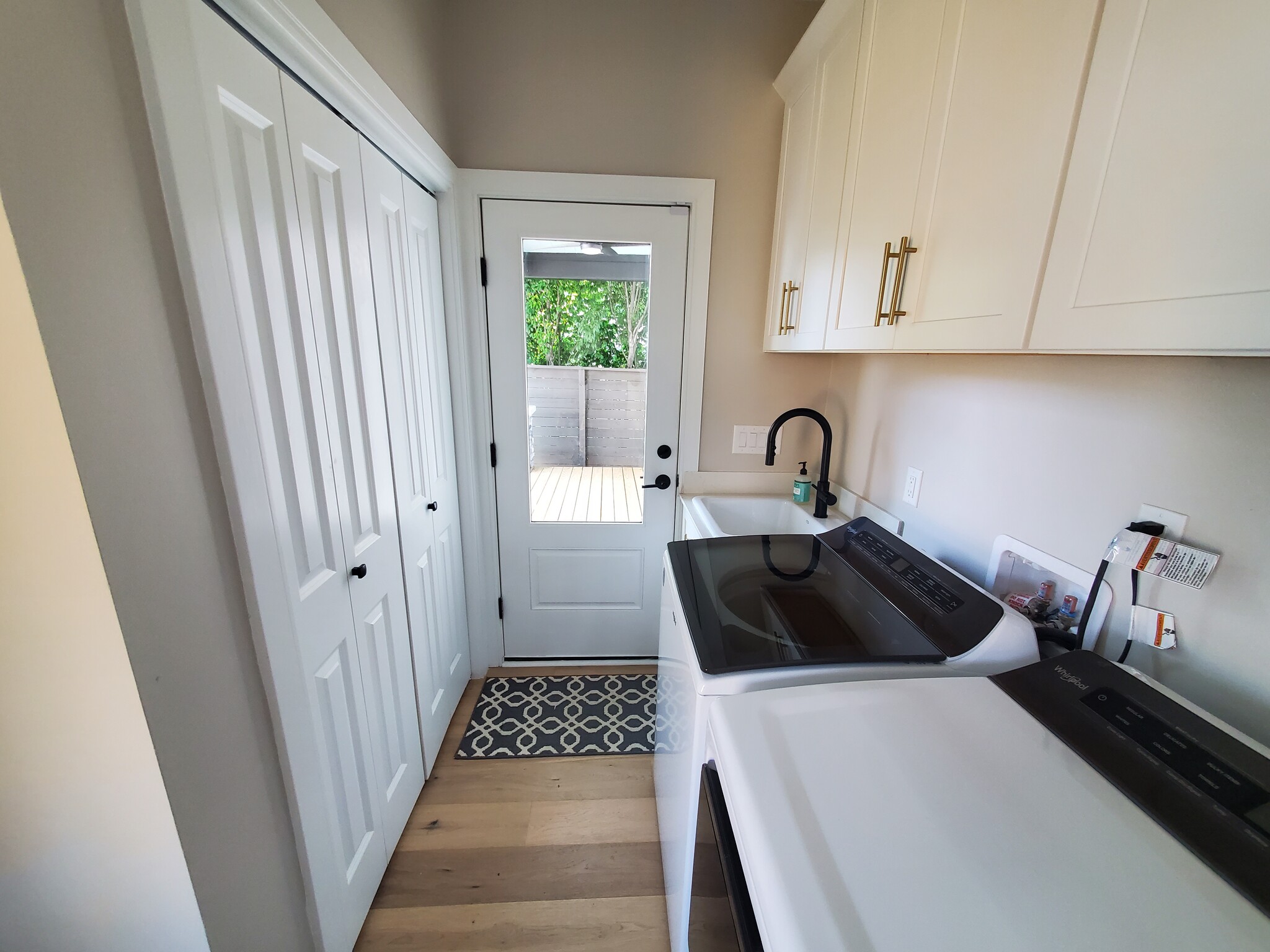 Laundry room also has access to back patio and a large coat closet. - 1021 Cheatham Pl