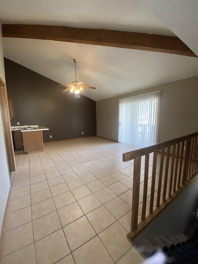 Living area with small patio deck - 205 W Cherry St