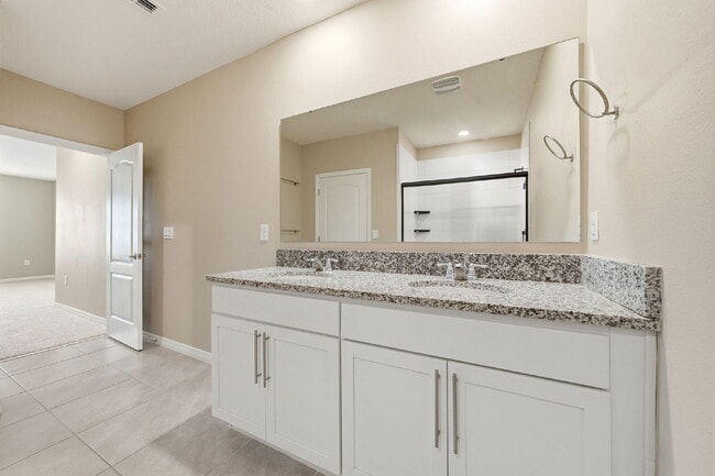 Building Photo - Three Bedroom, 2 Bathroom single family home with 2 Car Garage.
