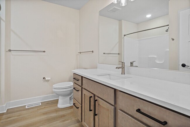 Building Photo - 3 Bed / 2.5 Bath Townhome w/Deck, Walkout Finished Basement, 9' Ceilings, Quartz Tops, Stainless ...