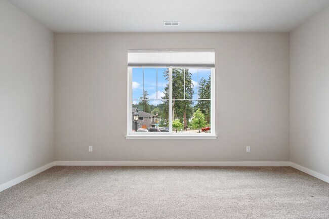 Building Photo - Community beach access! 4 bedrooms 2.5 baths.