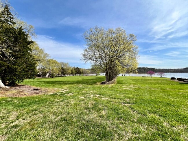 Building Photo - Adorable Waterfront/Fully Furnished/All In...
