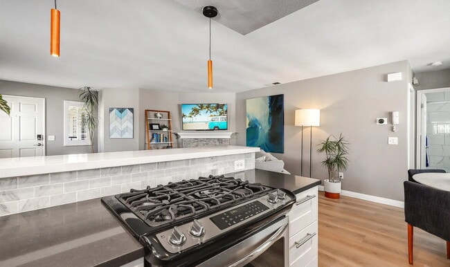 Building Photo - This quaint, gated complex is located on a...