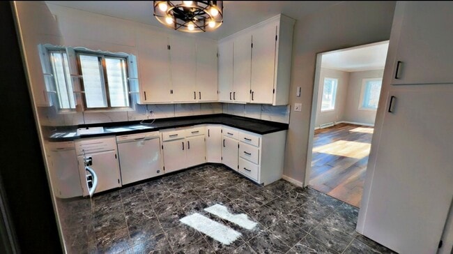 Building Photo - Charming Newly Renovated 3-Bedroom Rental with Garage & Basement