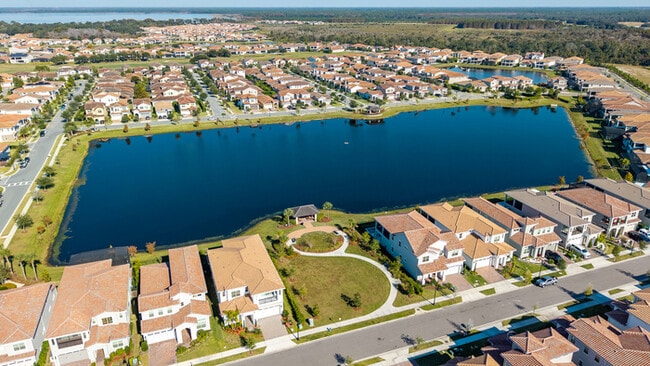 Building Photo - Luxury 5-Bedroom Residence in Eagle Creek with Indoor-Outdoor Living