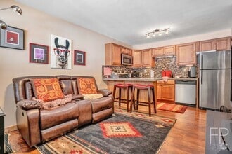 Building Photo - Year lease! Furnished, Move in 8/23/25! 10...