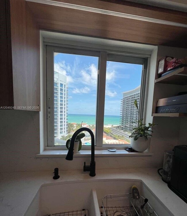 Building Photo - 5900 Collins Ave