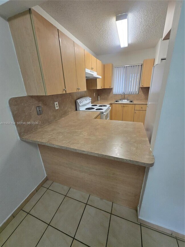 Building Photo - 6151 W 24th Ave