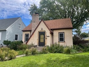 Building Photo - The Cutest 3-Bedroom Tudor - One Block From Como Golf Course