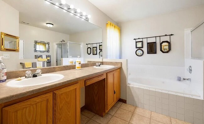 Building Photo - Spacious 5-Bedroom Home with Bonus Entertainment Room & Low-Maintenance Yard